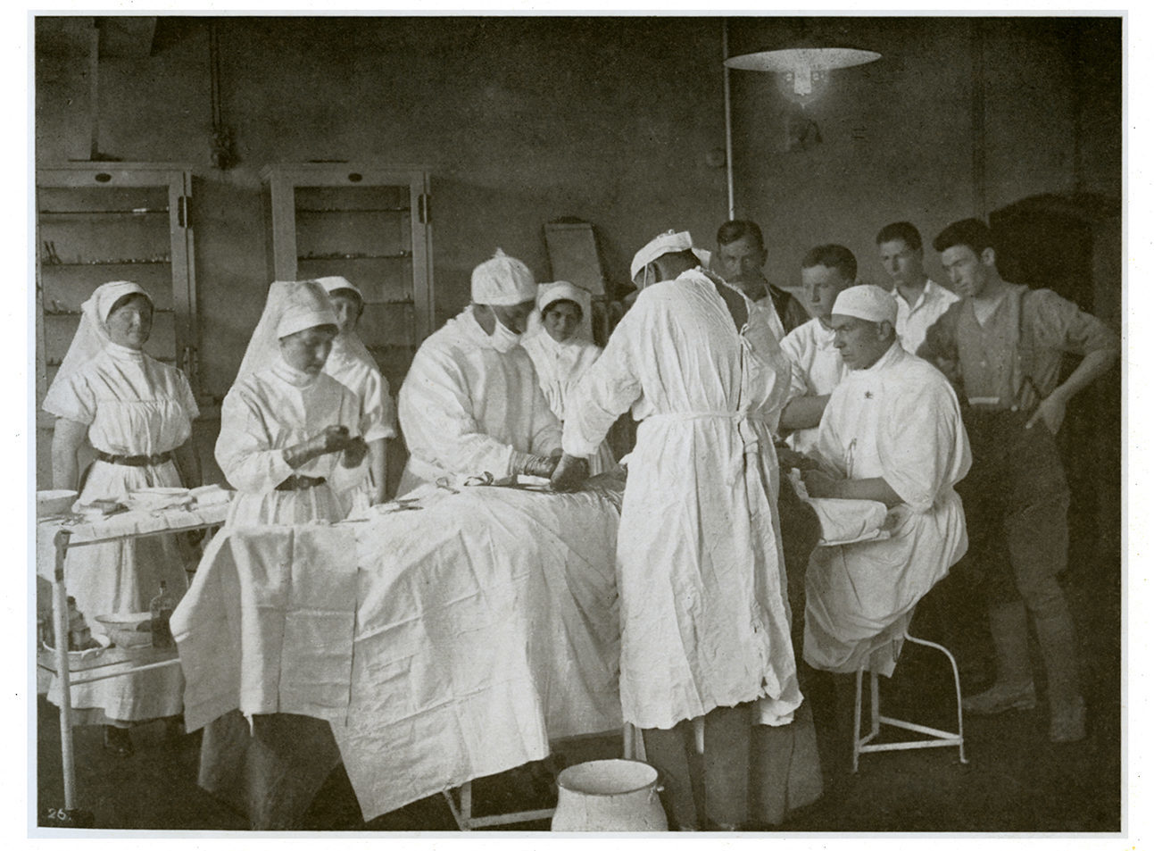 Surgery being performed in a converted cowshed in Boulogne, c. 1915-17. From A.H. Pirie’s Views Illustrating Life and Scenes in the Hospital, 1923.