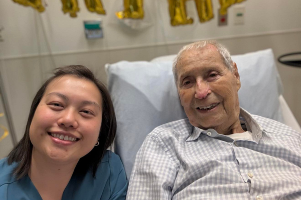 Joe Ullman and Nurse Y-Loan Ly