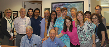 “We're all here for life above all,” says Diane Lebeau, “and life is made of tears, but also of smiles, laughter and memories.” First row: Trevor Bishop, volunteer; Pierre Hébert, housekeeping; Danielle Robert, music therapist intern, Dr. Stéfanie Gingras; Deborah Salmon, music therapist; Second row: Diane Lebeau, assistant nurse manager; Dr. Manuel Borod; Andréa Connors, volunteer, Bereavement coordinator; Felipe Mena, nurse; Norman Yean, nurse; Bonica Orng, pharmacist; Stan Shapiro, volunteer; Andrée Mathieu, nurse; Barbara Chapman, volunteer; Marylin Wong, nurse; Dr. Krista Lawlor.
