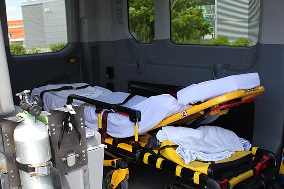 The Ford Transit 250 can accommodate a stretcher and carry one patient at a time plus a nurse and up to two members of the patient's family. Oxygen can be administered to the patient if needed.