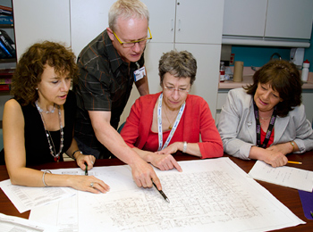 Andréane Pharand, Mario Bonenfant, Dr. Therese Perreault and Lynn Lauzon review the plans of their new unit