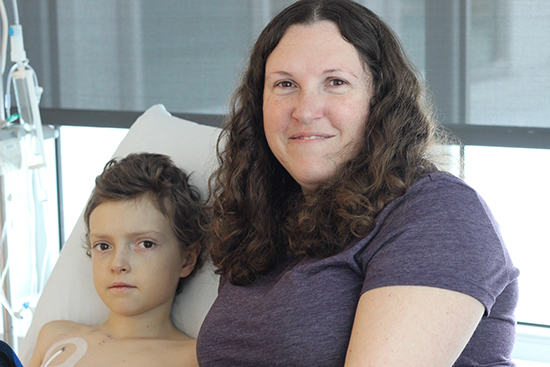 Sebastian Call, pictured here with his mother Jennifer Wykes, needed urgent access to an experimental medication for his leukemia. His oncologist, Dr. Sharon Abish, and the MUHC Research Ethics Board teamed up to design a made-to-measure study for the boy.