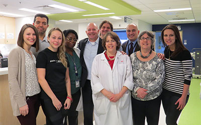 From left to right, back row: Dr. Jamil Asselah, Beverle Henry (assistant nurse manager), Serges Bériault, Dr. George Zogopoulos, Dr. Peter Ghali; front row: Aspen Gagné (nurse clinician), Chloé Bériault (Serges’ daughter), Norine Heywood (nurse clinician specialist in transplant), Valerie Cass (nurse manager), Nadia Zouari (nurse clinician).