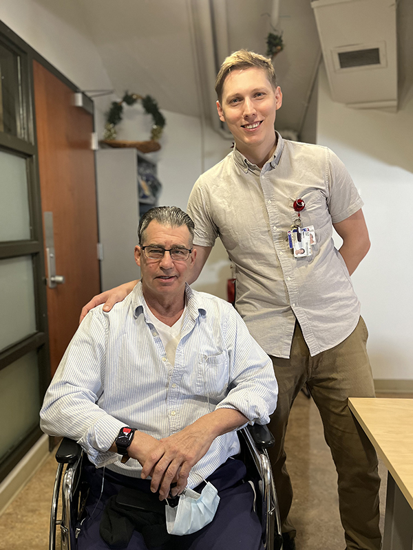 Patient Kevin Murphy and Nikolai Lartsev, orthopaedic case manager at the MGH, MUHC