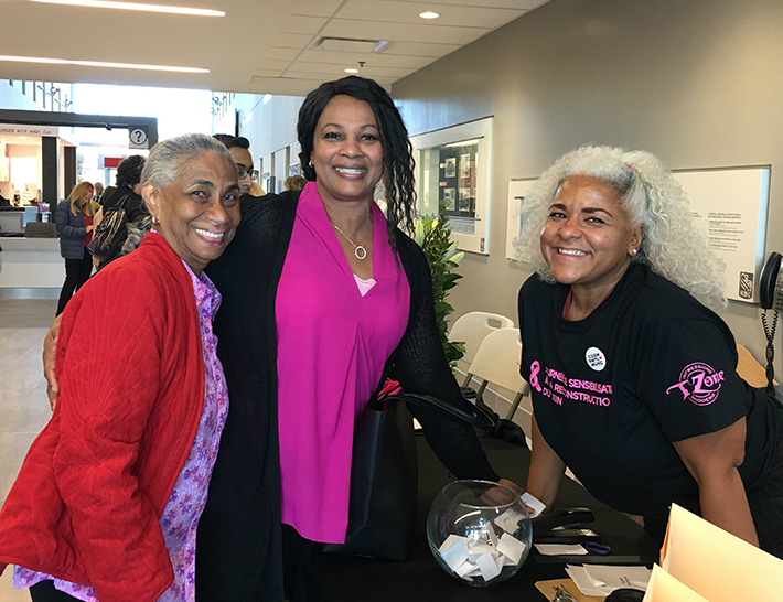 Deneise Ottley, her mother and Angela Alston, co-organizer of the event