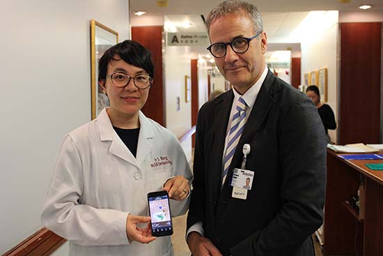 Dr. Sheila Wang (showing mobile app Swift Skin and Wound) and Dr. Greg Berry