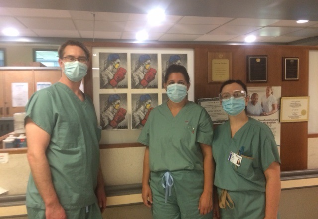 Physiotherapists from the Montreal General Hospital, COVID Unit on the 18th floor, from left to right: David Cassidy, Rebecca Punjabi, Elena Mollica