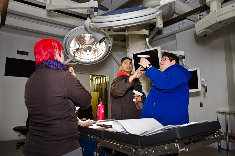 Employees testing OR equipment
